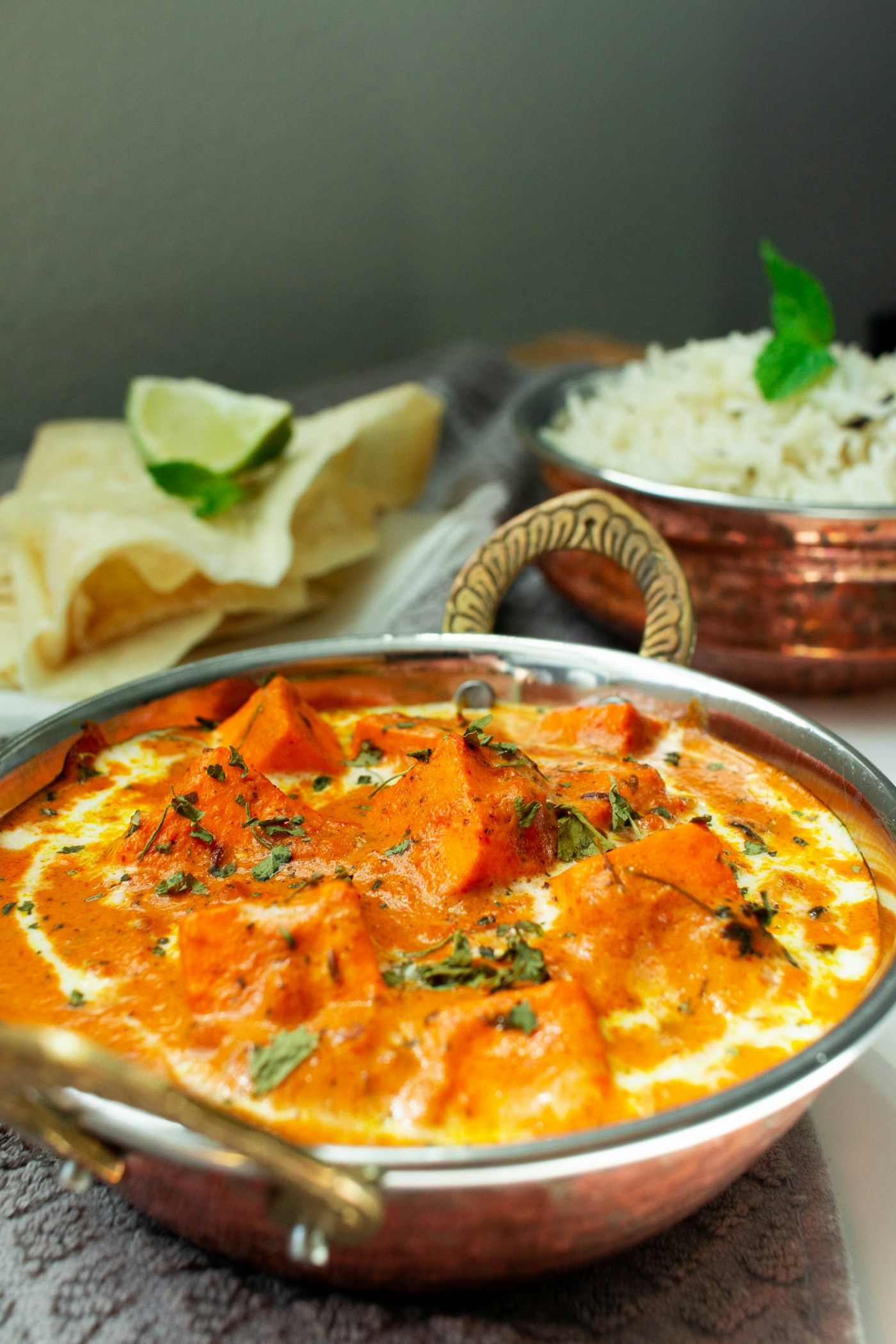 Paneer curry served with rice and bread